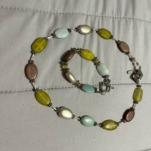 Brown and Green Beaded Necklace with Oval Design